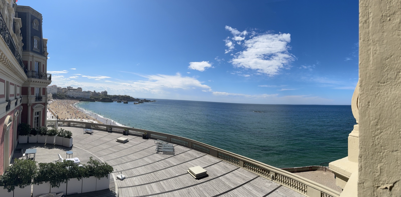 Ocean and beach seen from a terrace at Hôtel du Palais