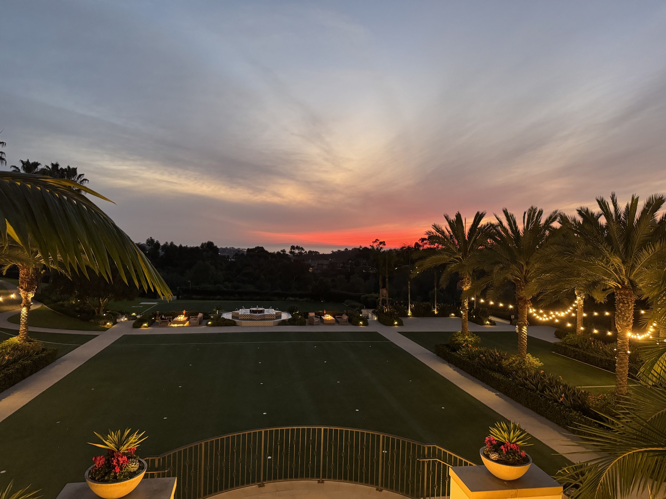 Sunset over the palm-lined grounds at Park Hyatt Aviara