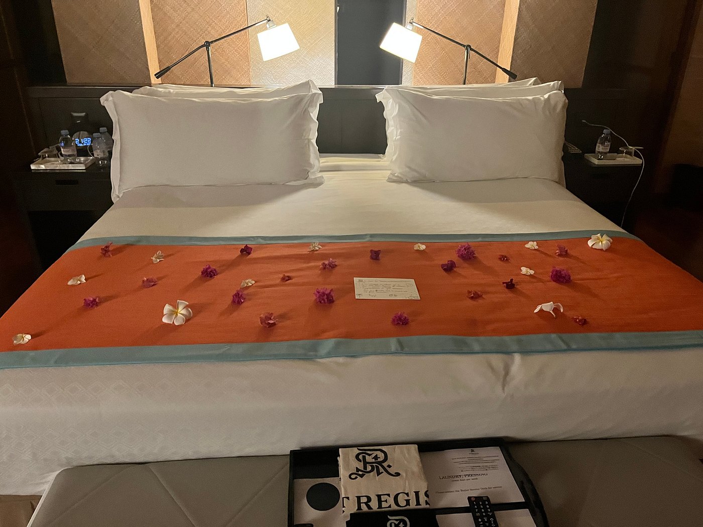 Guest bedroom at The St. Regis Bora Bora Resort